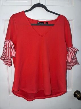 NEW YORK AND COMPANY  Coral Red V-Neck Top with Striped Ruffle Sleeves